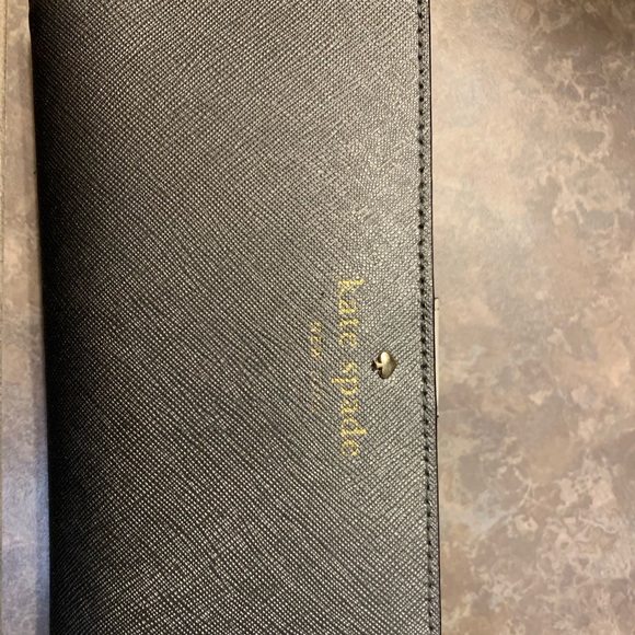 kate spade Handbags - Kate Spade, silver wallet like new.